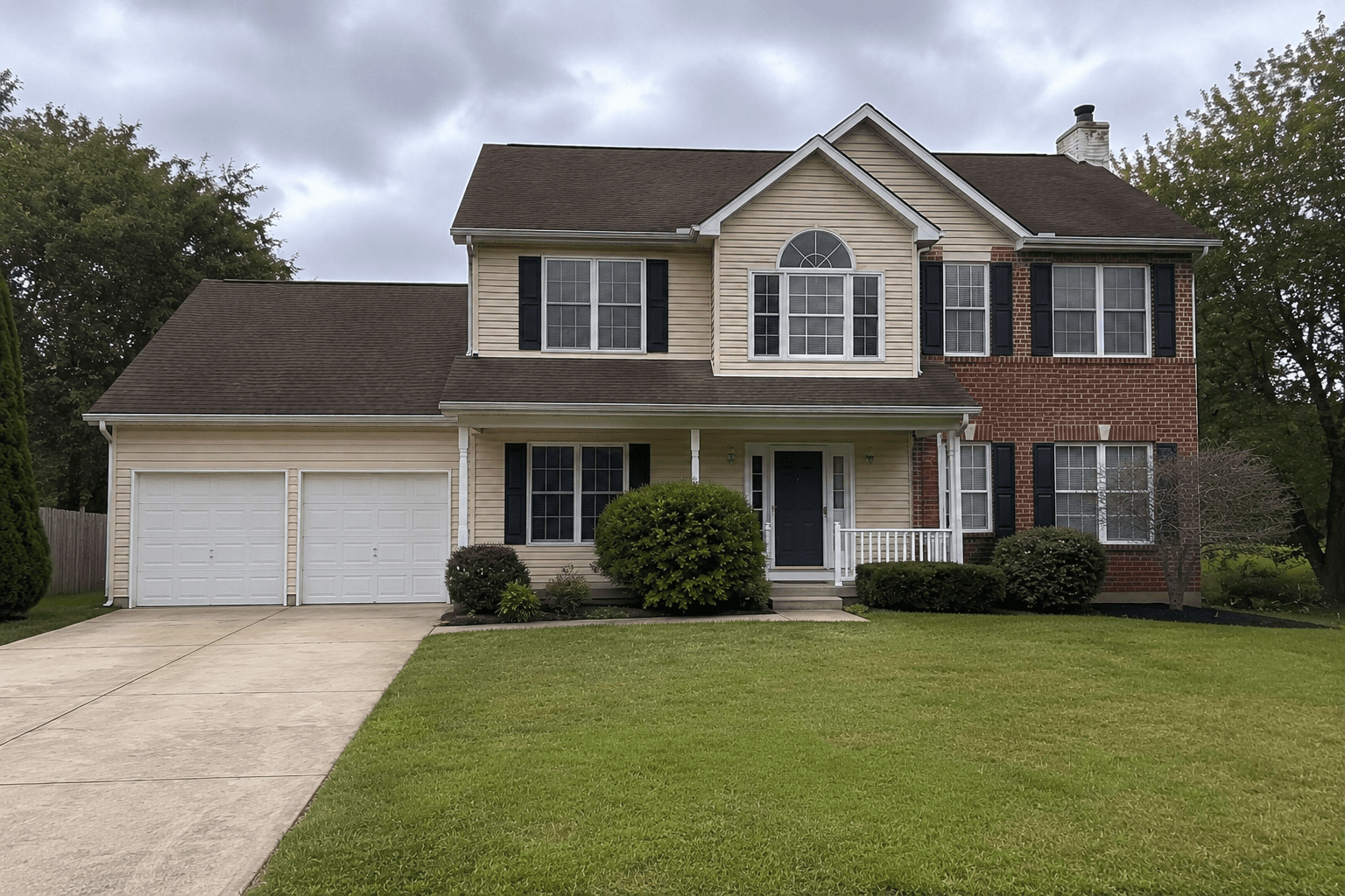 A 1990s two-story suburban home representative of the analyzed property